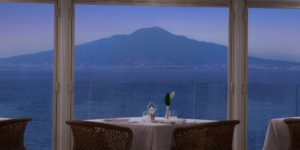 La Terrasse Royal Restaurant a table perched over the sea with stunning view of the Gulf of Naples